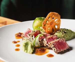 Tuna dish prepared medium rare.